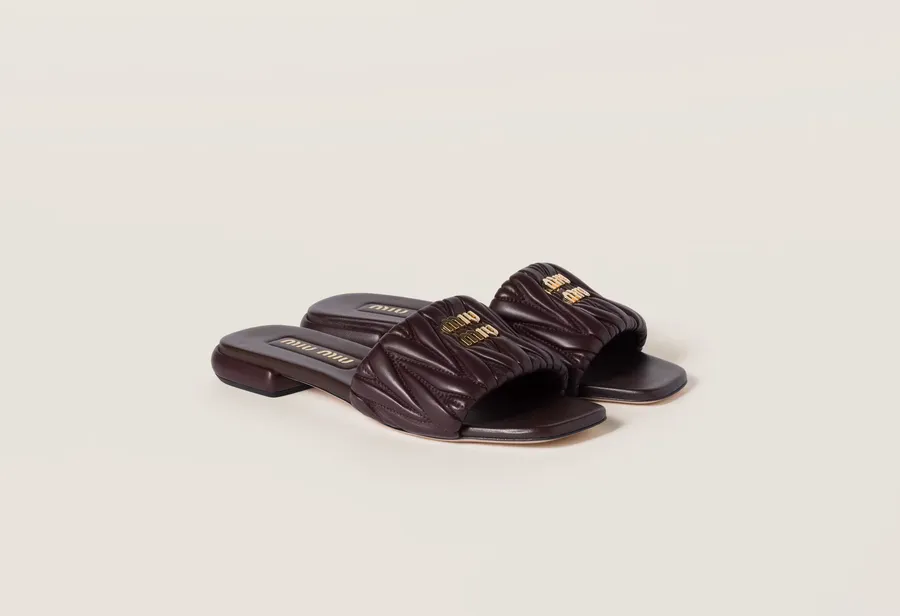 Miu Miu, Matelassé nappa leather slides 